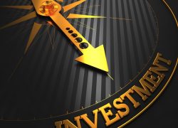 Investment,-,Business,Background.,Golden,Compass,Needle,On,A,Black Investment,-,Business,Background.,Golden,Compass,Needle,On,A,Black