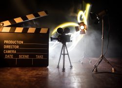 Movie,Concept.,Miniature,Movie,Set,On,Dark,Toned,Background,With