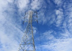 A,Train,Tower,With,A,Background,Of,Blue,Sky,And